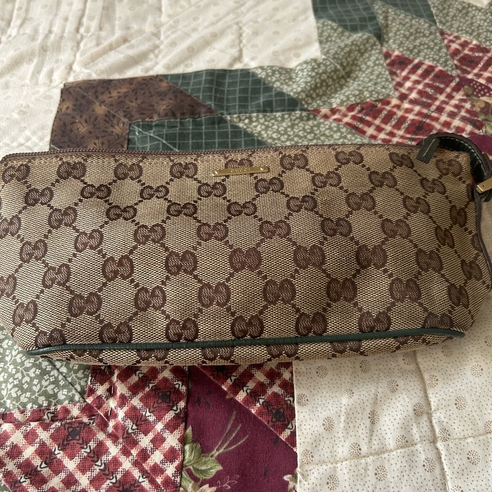 Gucci Brown Monogram Clutch